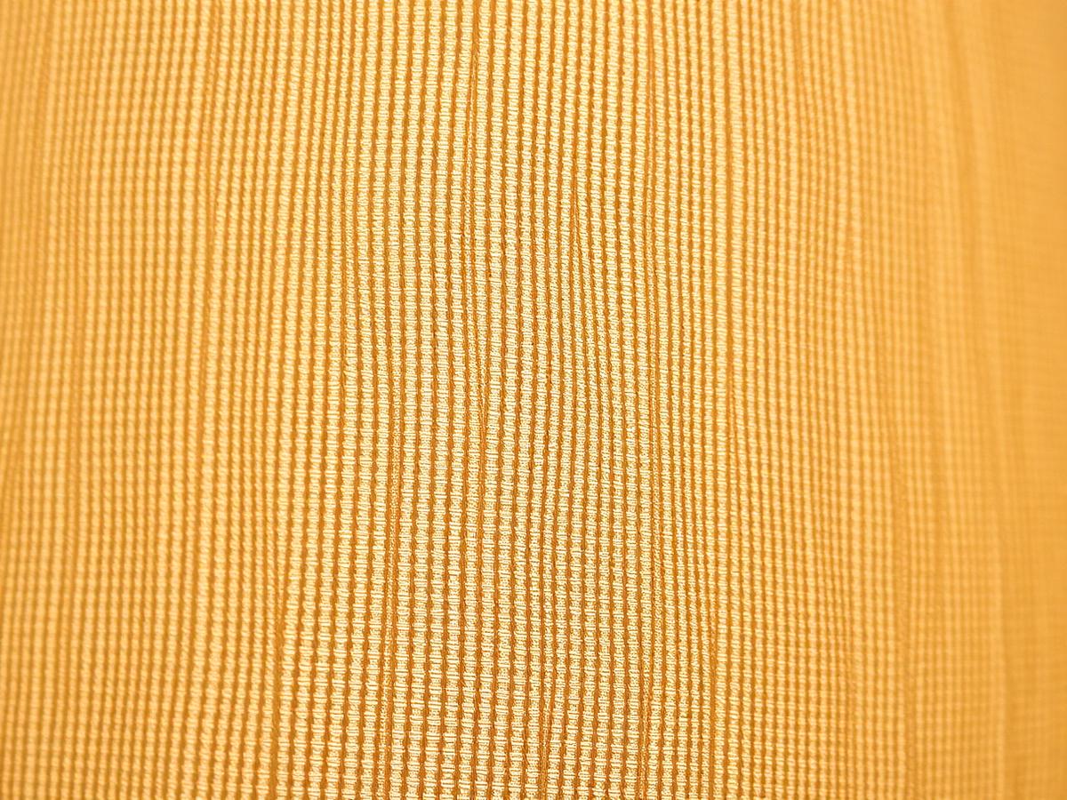 Close-up of woven linen lampshade fabric texture